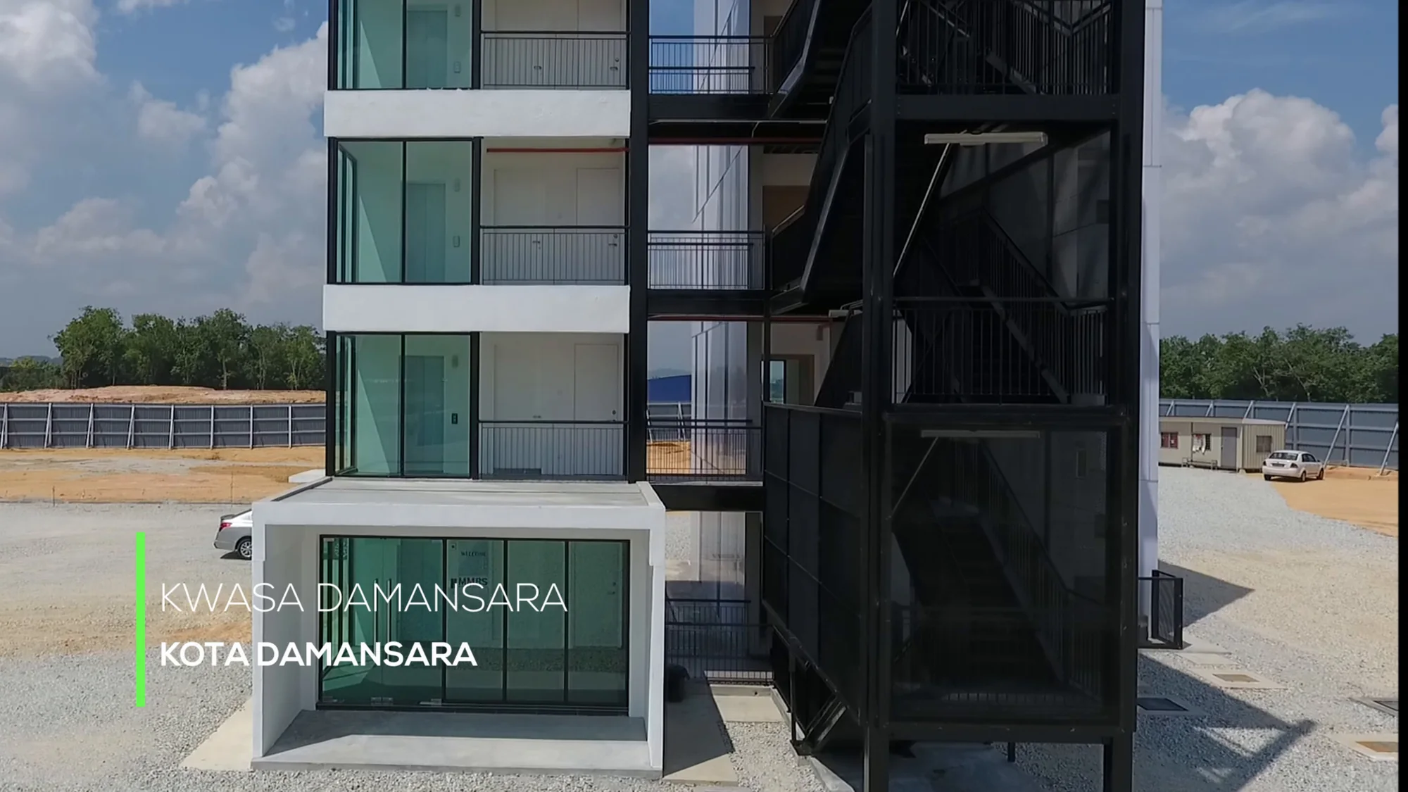 Show unit block exterior with the KWASA Damansara, Kota Damansara title