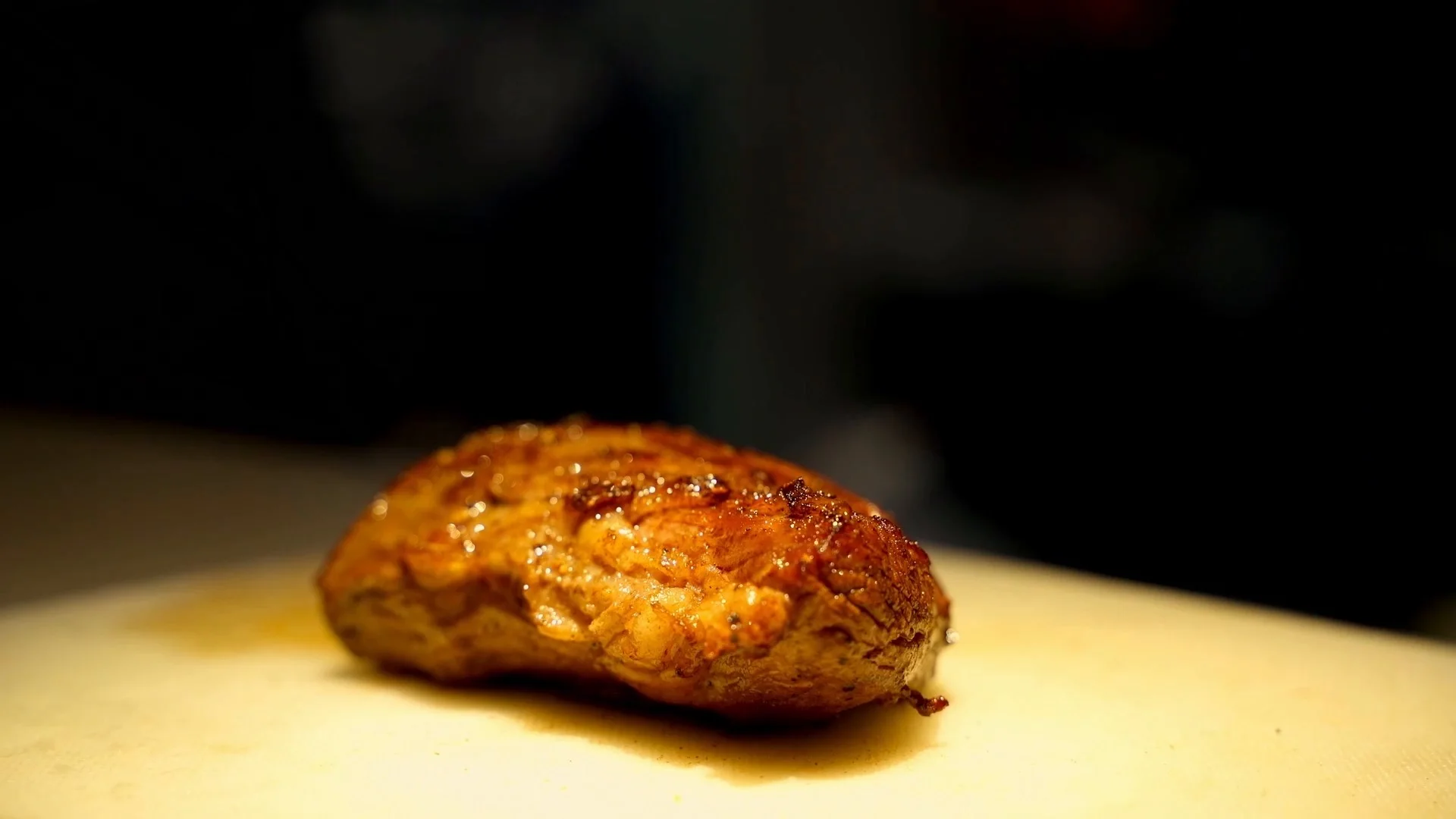 Seared Wagyu resting on a board