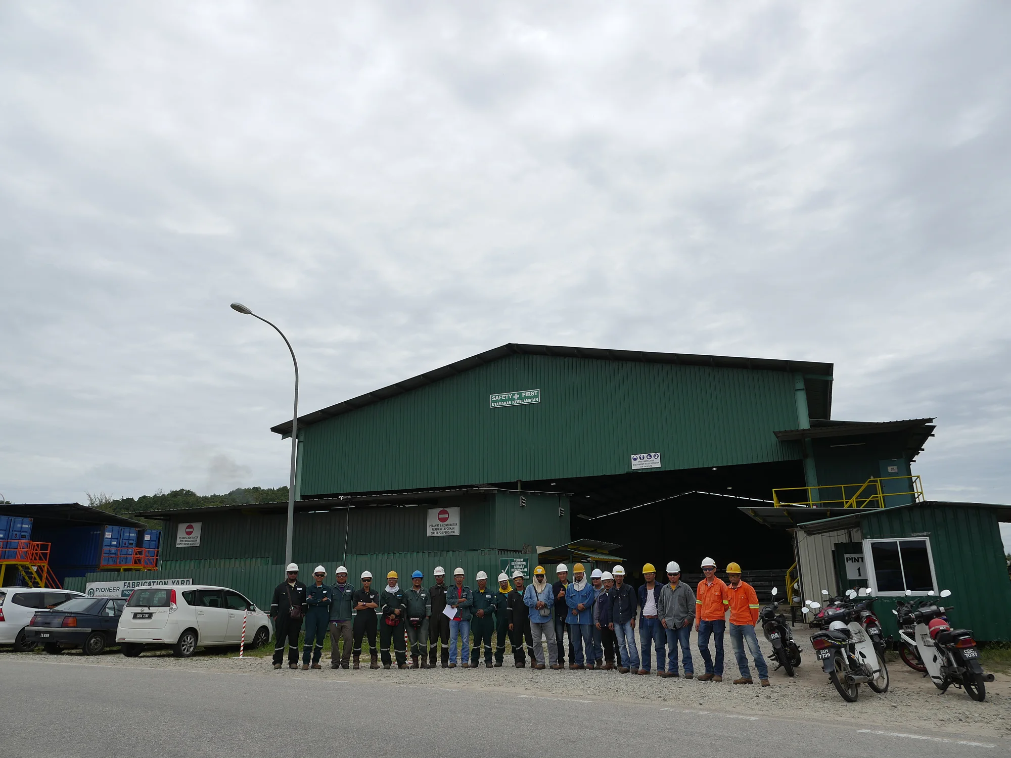 PESB team photographed in front of the company building